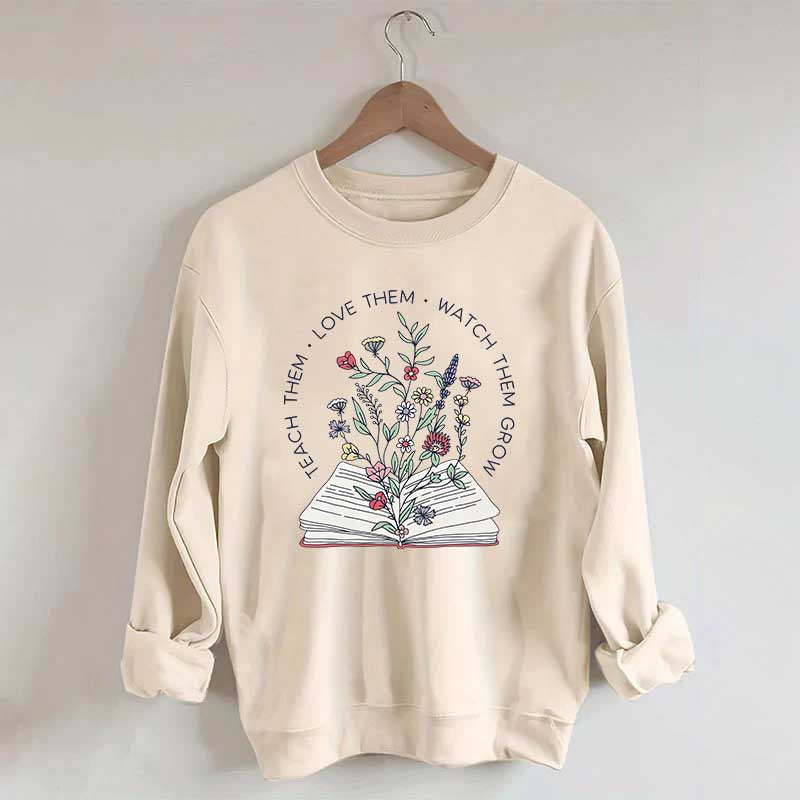 Teach Them Love Floral Book Sweatshirt