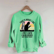 That's What I Do I Pet Cats I Read Books And I Know Things Sweatshirt