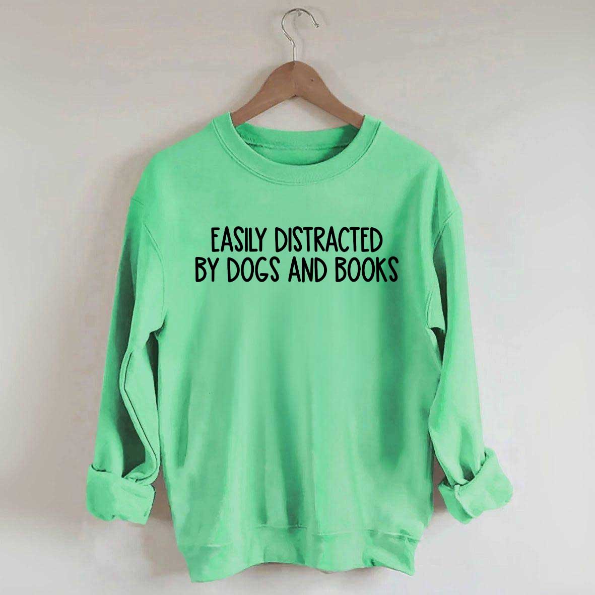 Funny Easily Distracted By Dogs And Books Lover Sweatshirt