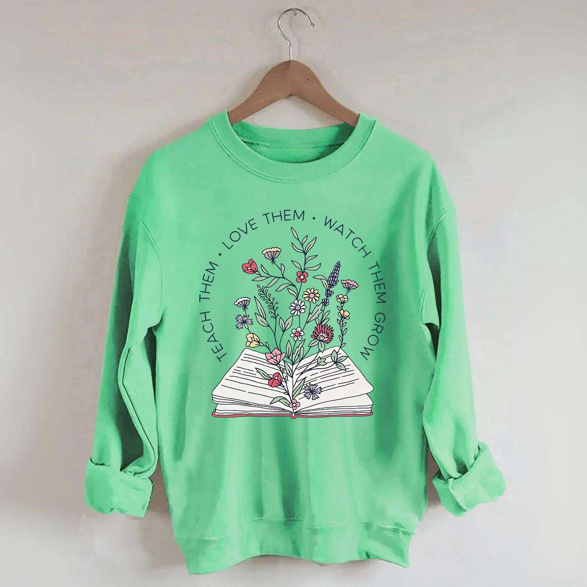 Teach Them Love Floral Book Sweatshirt