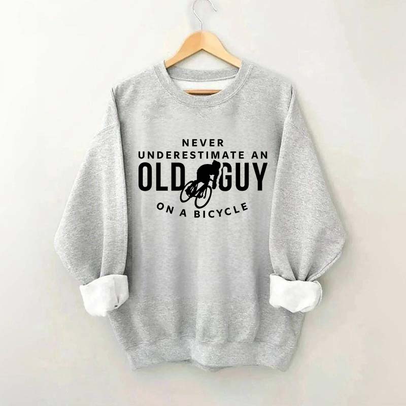 Never Underestimate An Old Guy On A Bicycle Sweatshirt