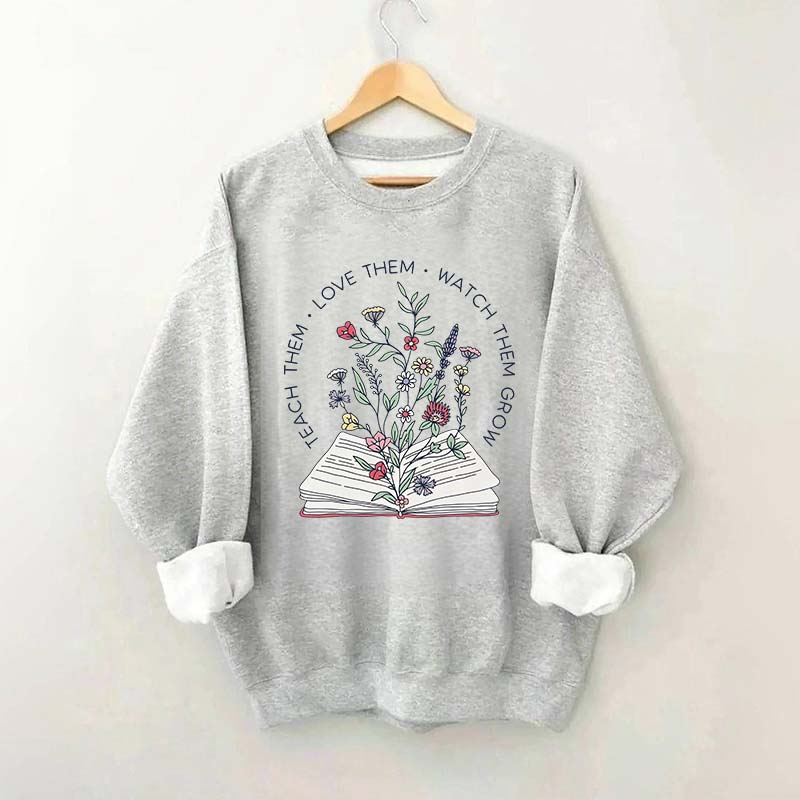 Teach Them Love Floral Book Sweatshirt