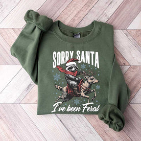 Christmas Raccoon Sorry Santa I've been Feral Sweatshirt