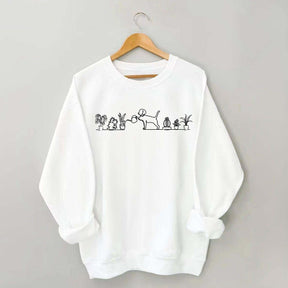 Dog Watering Plants Sweatshirt
