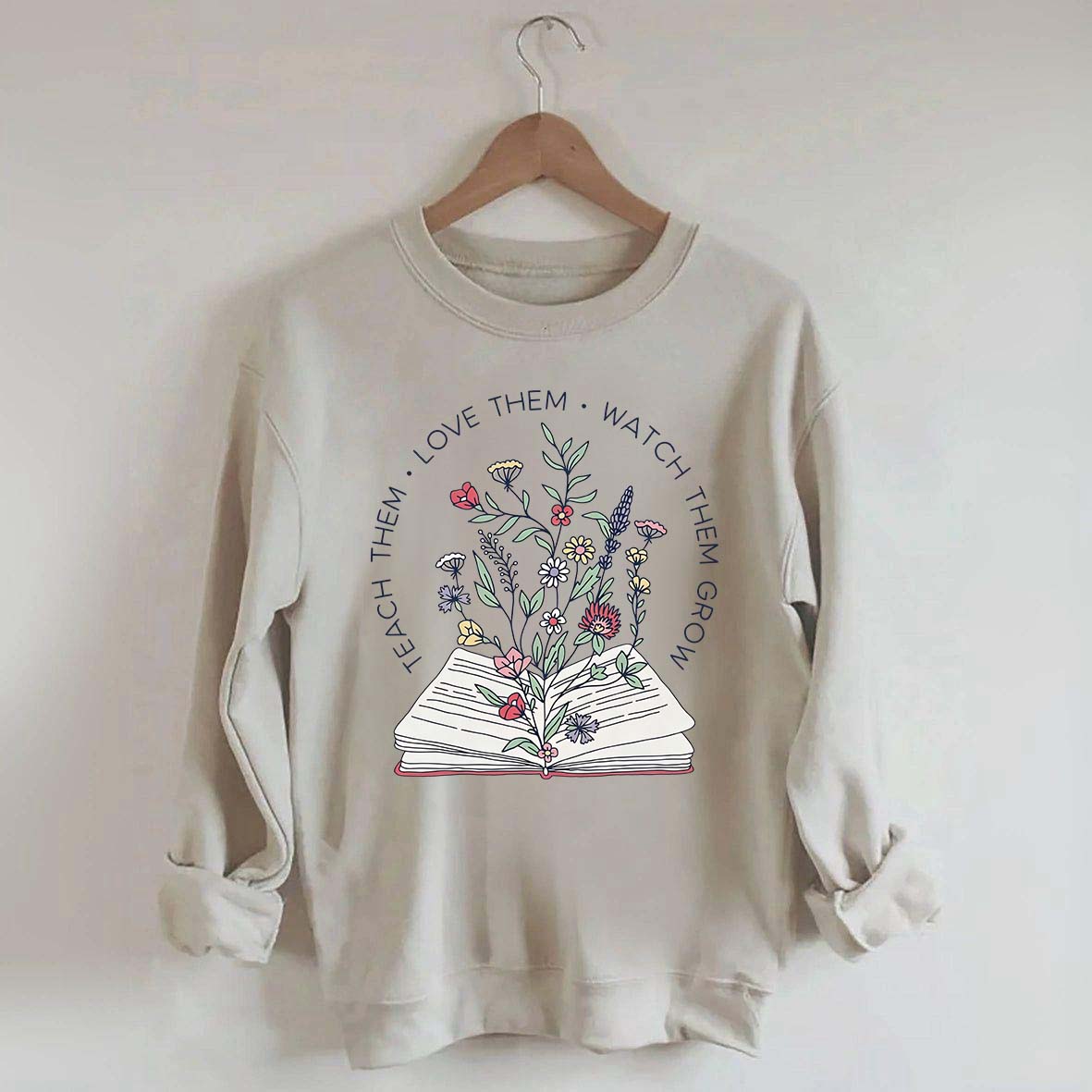 Teach Them Love Floral Book Sweatshirt