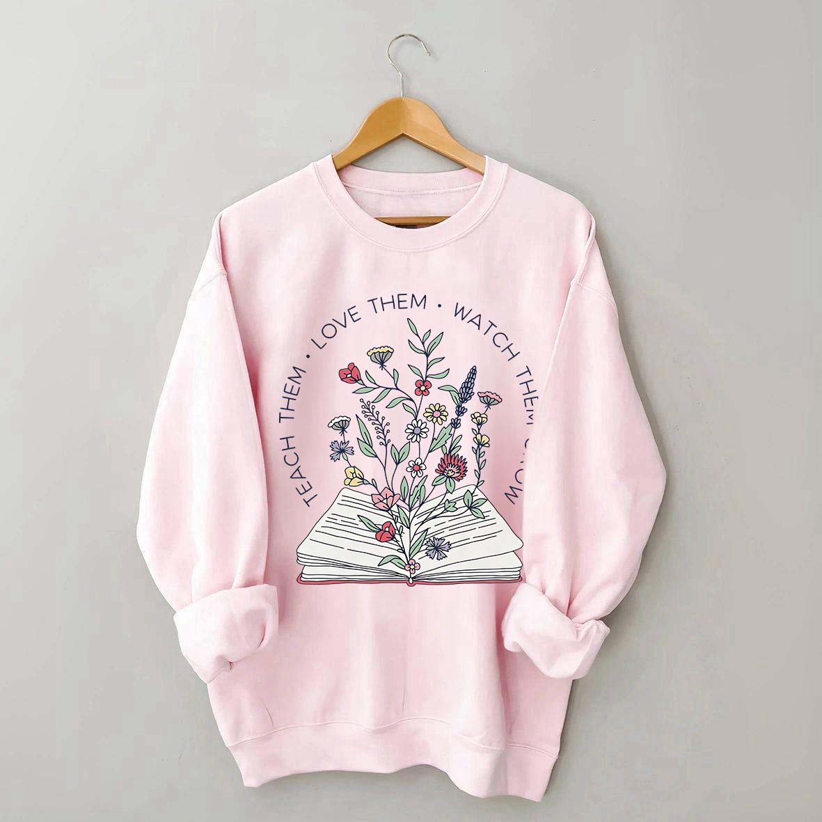 Teach Them Love Floral Book Sweatshirt
