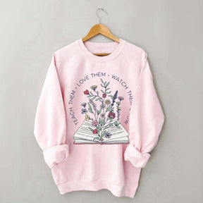 Teach Them Love Floral Book Sweatshirt