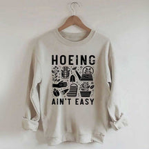 Hoeing Ain't Easy Plant Lover Sweatshirt