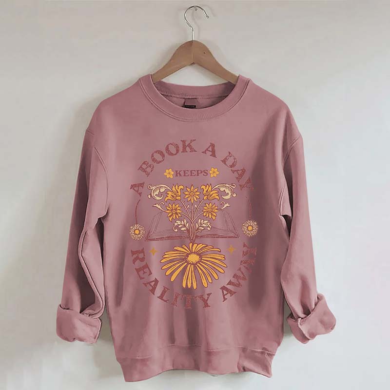 A Book A Day Keeps Reality Away Sweatshirt