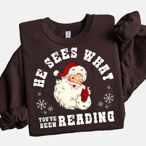 He Sees What You've Been Reading Santa Sweatshirt