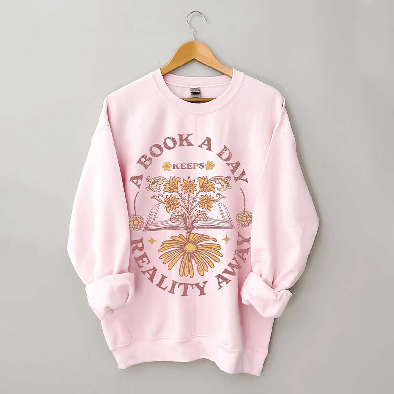 A Book A Day Keeps Reality Away Sweatshirt