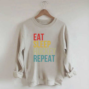 Eat Sleep Hockey Repeat Sweatshirt