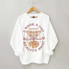A Book A Day Keeps Reality Away Sweatshirt