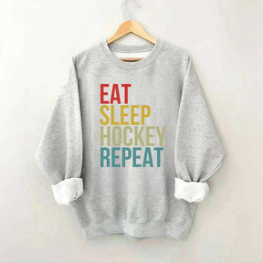 Eat Sleep Hockey Repeat Sweatshirt