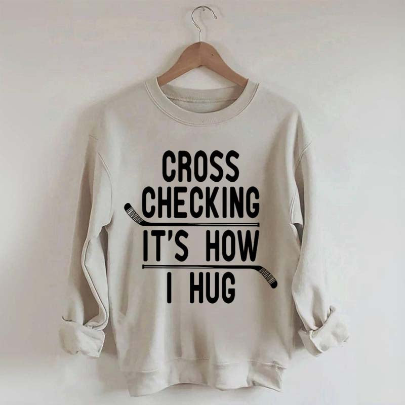 Cross Checking It's How I Hug Sweatshirt