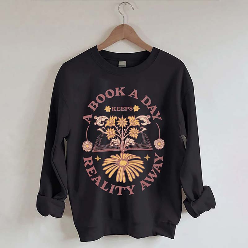 A Book A Day Keeps Reality Away Sweatshirt
