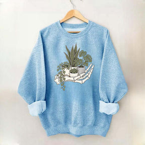 Skeleton Hand Cradling Potted Plants Sweatshirt