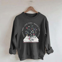 Teach Them Love Floral Book Sweatshirt