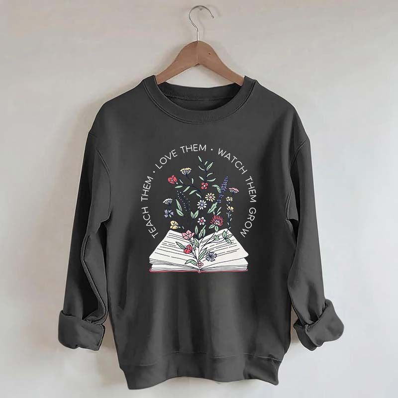 Teach Them Love Floral Book Sweatshirt
