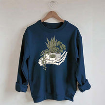 Skeleton Hand Cradling Potted Plants Sweatshirt