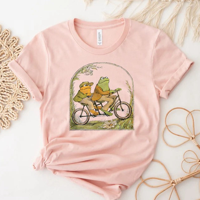 Frog And Toad -Riding Bike T-paita