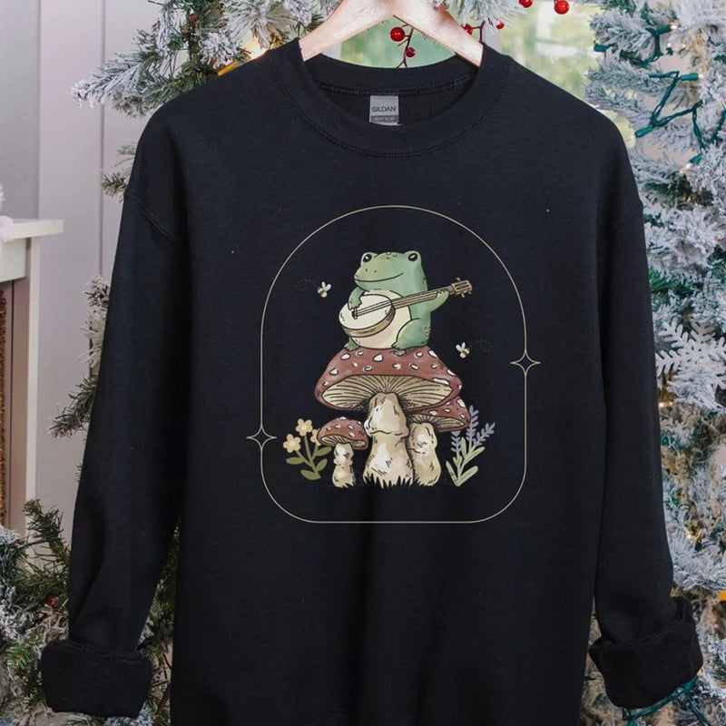 Frosch auf einem Pilz-Sweatshirt 